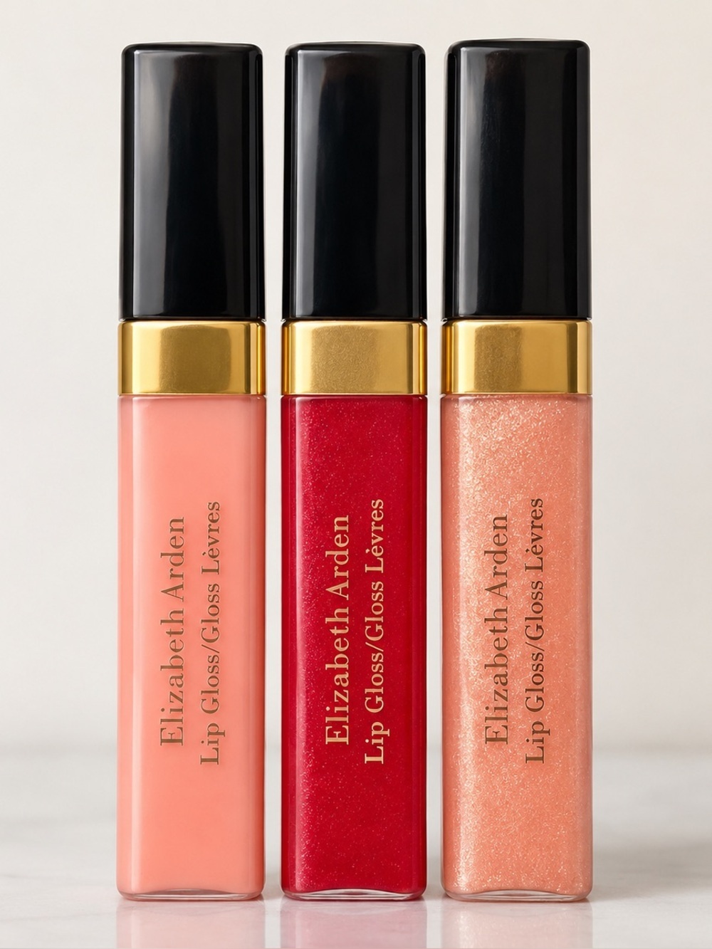 Elizabeth Arden Lip Gloss Set — Coral Pink, Classic Red, Shimmer Peach